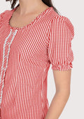 Festive Dirndl blouse in red gingham with lace detailing, designed for Oktoberfest and cultural gatherings.
