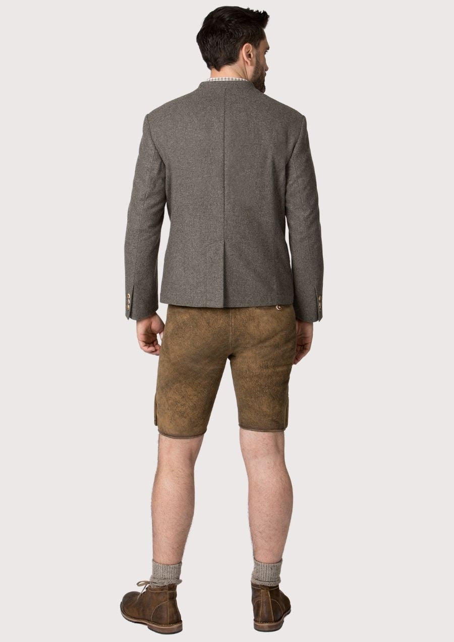 Elegant Bavarian-style men’s grey wool jacket with chest pocket.
