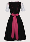Elegant Oktoberfest Dirndl dress in black and pink featuring floral embroidery, fitted corset bodice, white puff sleeves, and a pleated pink apron.