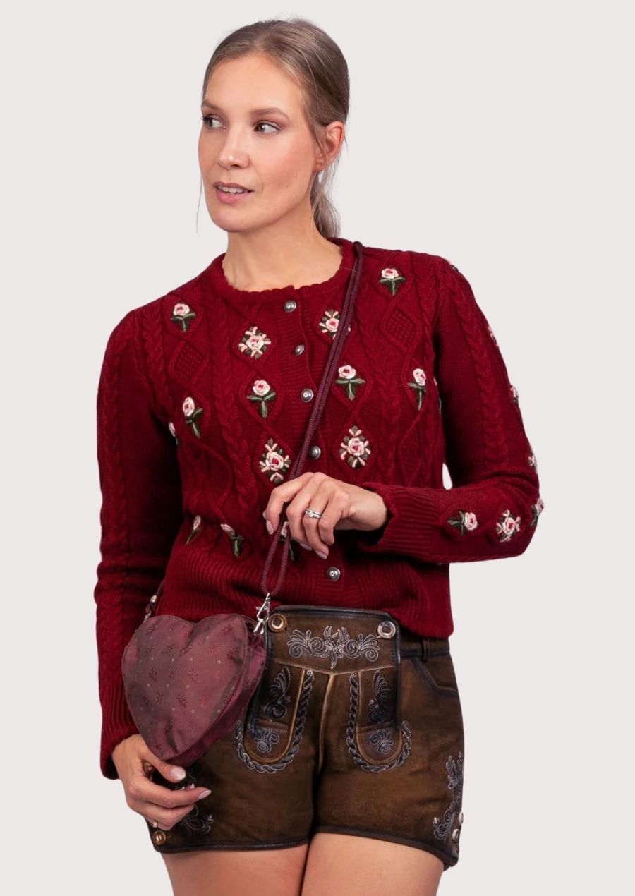 Women's embroidered Bavarian lederhosen shorts crafted from rustic suede leather with authentic heritage detailing.