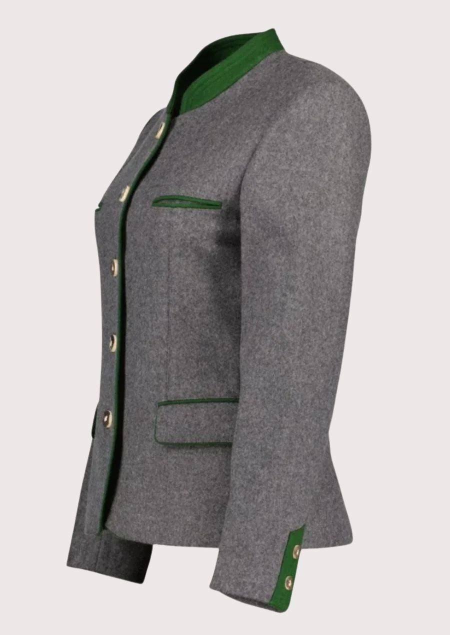 Grey women’s alpine jacket with green trim and structured tailoring.