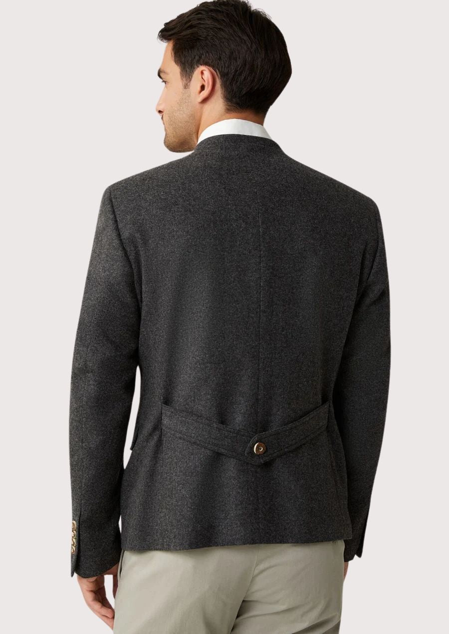 Heritage Bavarian-style wool jacket in charcoal grey, featuring stand collar, wooden buttons, structured back seam, and timeless traditional look.
