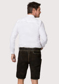 Authentic goatskin suede lederhosen showcasing intricate embroidery and antique-finished leather texture