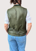 Traditional fitted green women’s vest front view.
