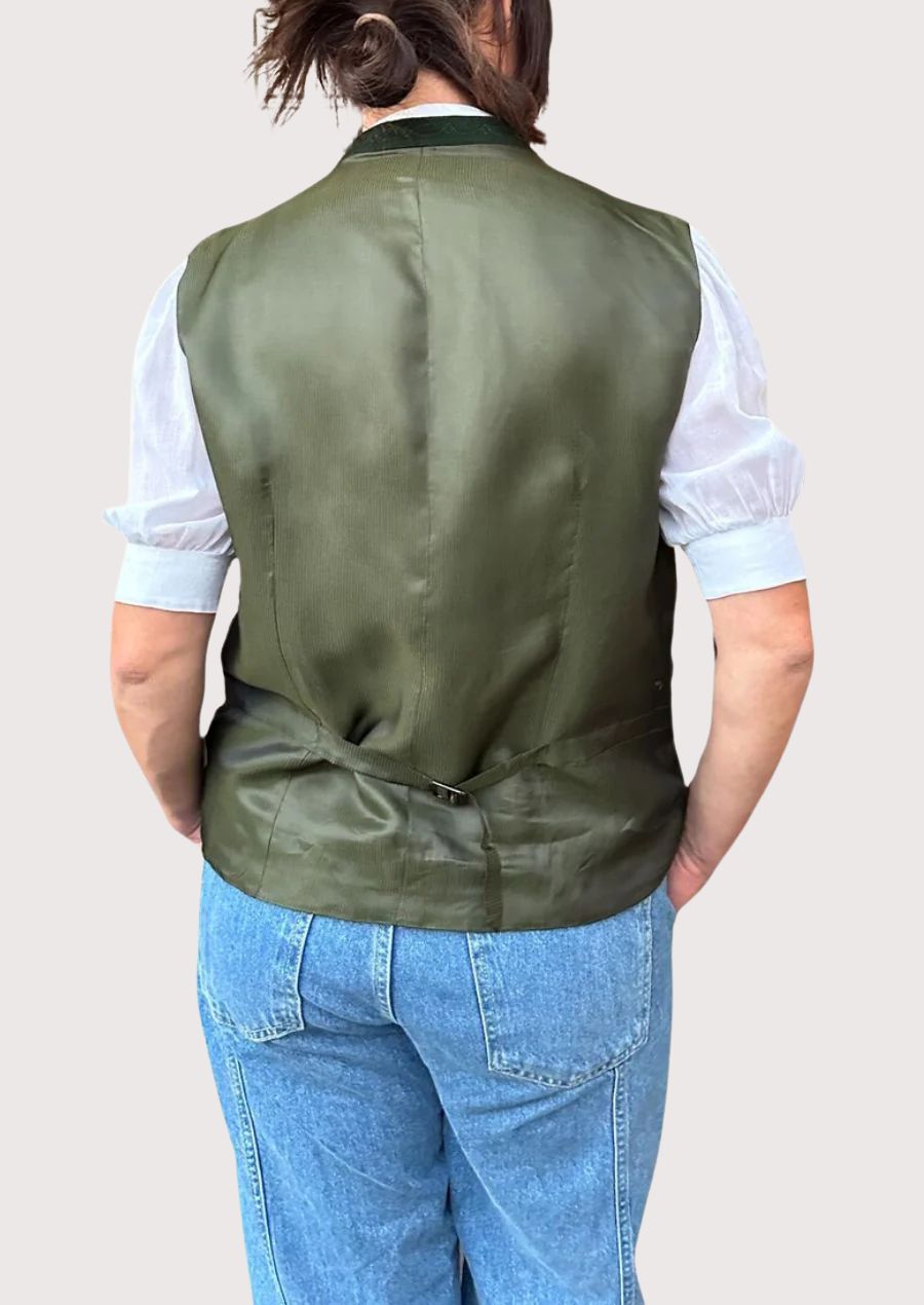 Traditional fitted green women’s vest front view.