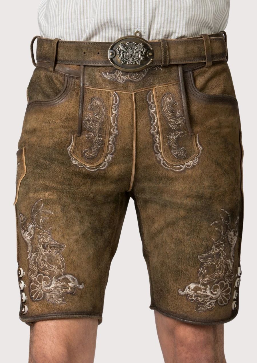 heritage stag leather lederhosen men featuring embroidered motifs paired with a light striped shirt for timeless Bavarian fashion
