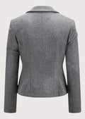 Light grey women’s alpine blazer with tailored waist and decorative buttons.