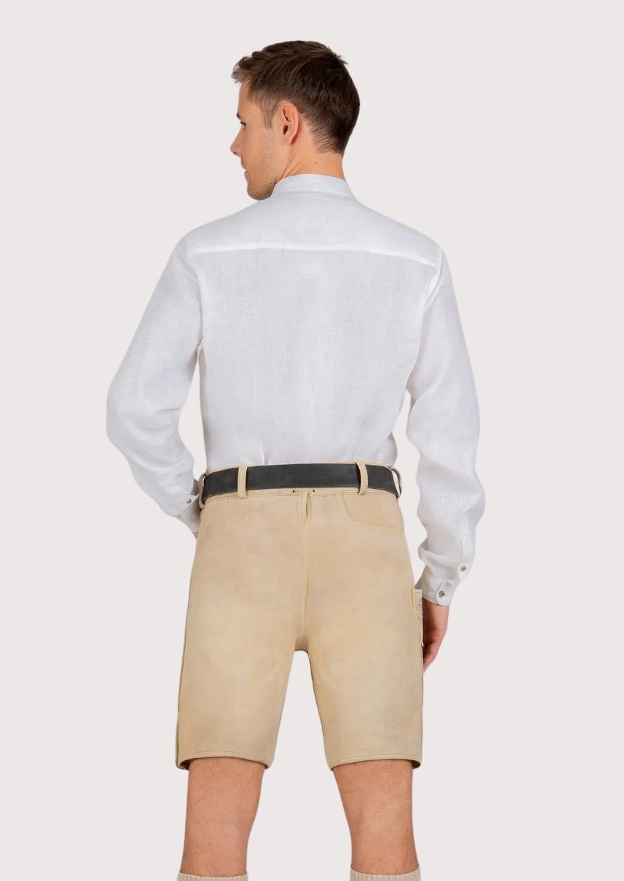 Premium cream goatskin suede lederhosen with intricate embroidery and a classic Oktoberfest aesthetic