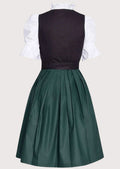 Luxury lace-up Dirndl dress with an emerald green bodice, black apron, white blouse, fitted waist, and sophisticated Alpine fashion styling.