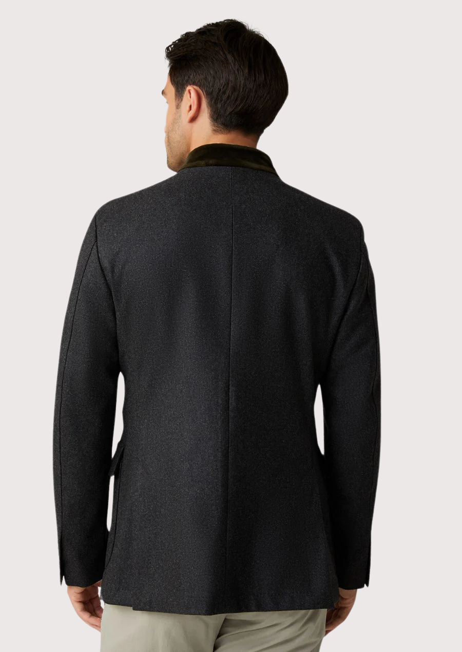 Men wearing a dark grey traditional jacket with modern tailoring.