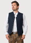 Classic alpine wool vest in deep blue paired with lederhosen