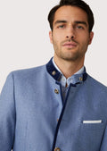 Sophisticated men's Bavarian blazer in premium wool with gold-toned buttons and velvet collar, perfect for fall festivals.

