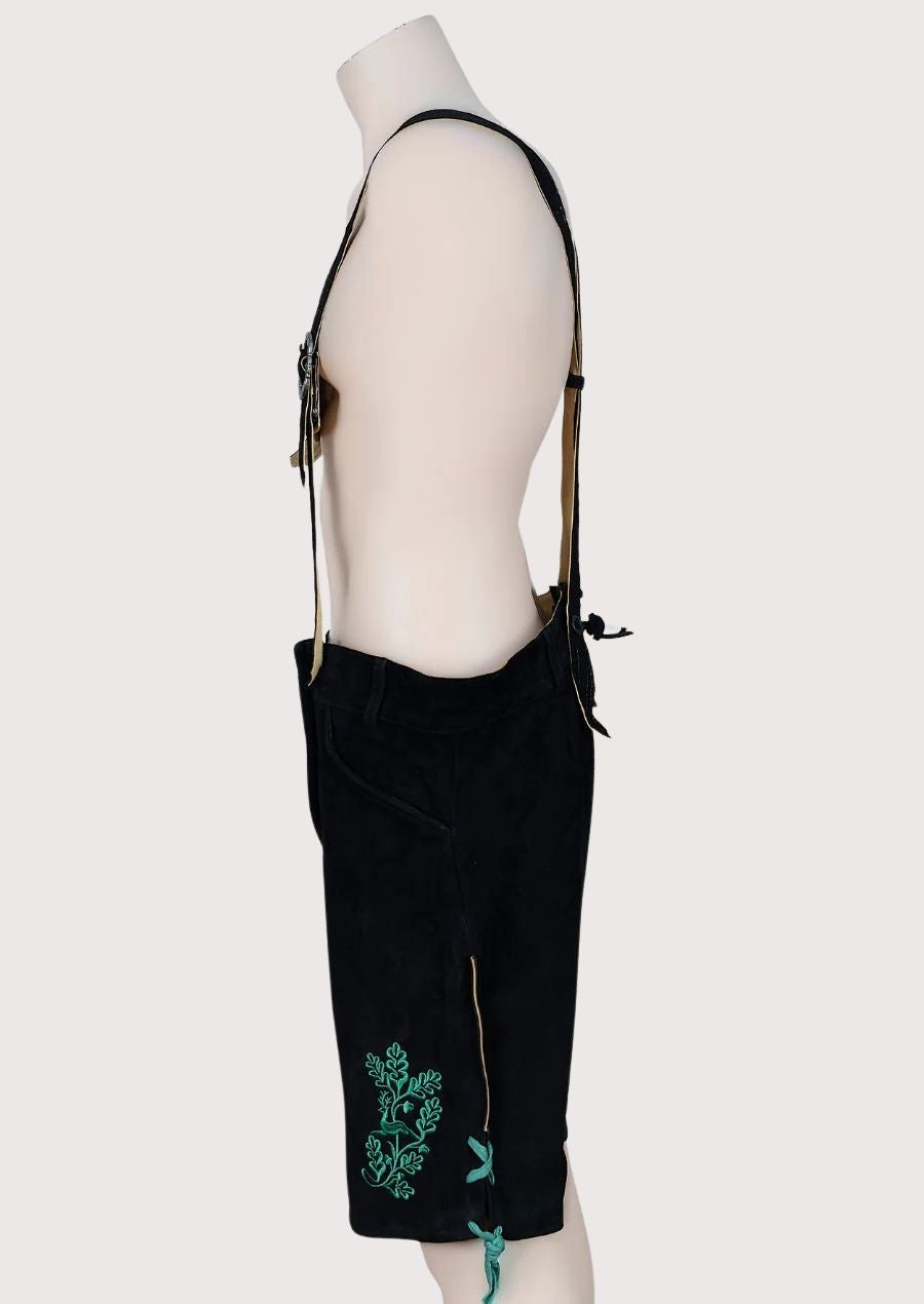 Men’s Bavarian Lederhosen with intricate green embroidery

