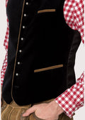 Elegant black Bavarian vest with wooden button accents and modern tailoring, perfect for Oktoberfest and weddings.

