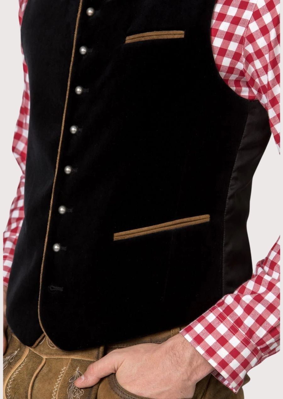 Elegant black Bavarian vest with wooden button accents and modern tailoring, perfect for Oktoberfest and weddings.

