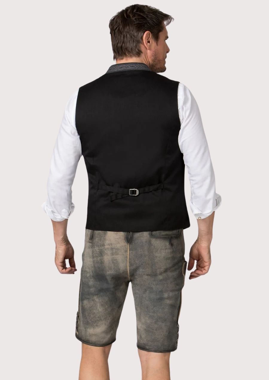 Stylish men’s Bavarian vest with embroidered details, modern fit, and wooden buttons, perfect for weddings and cultural events.

