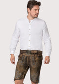 Traditional brown goatskin suede lederhosen featuring light blue Alpine embroidery and decorative side lacing