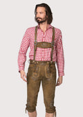 Men wearing rustic brown goatskin suede Bundhosen with suspenders, embroidered details, and traditional Bavarian styling