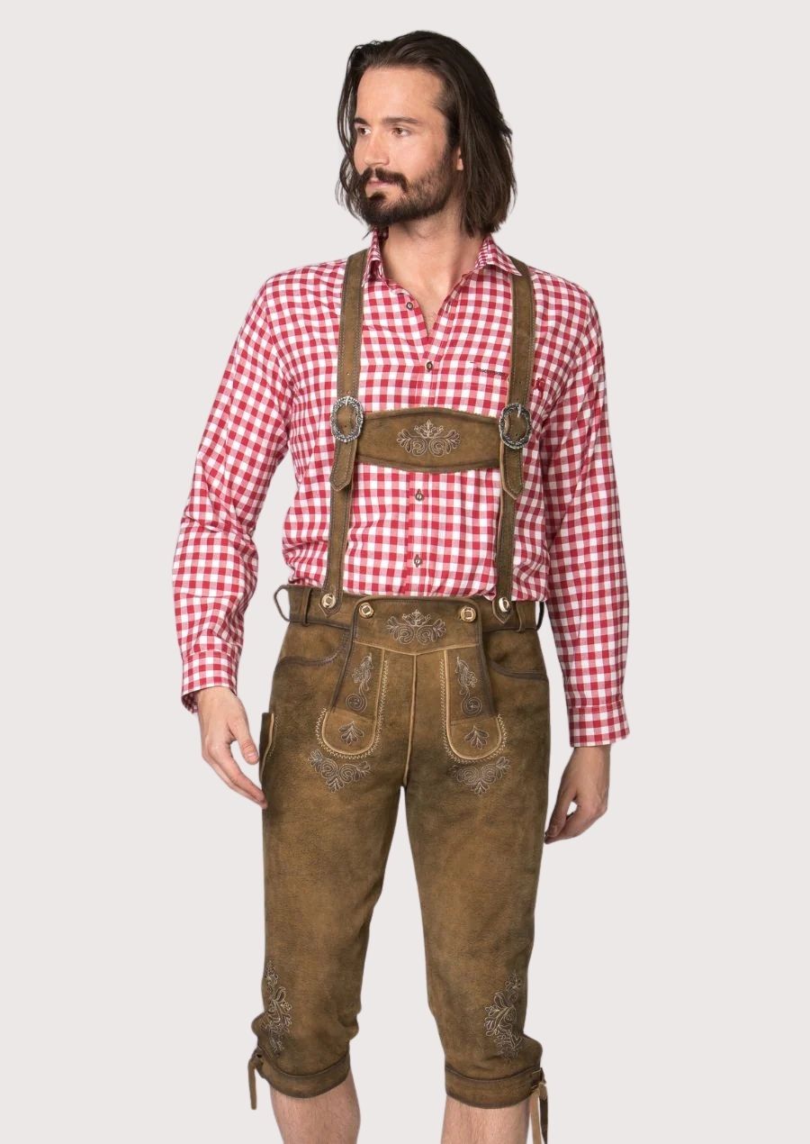 Men wearing rustic brown goatskin suede Bundhosen with suspenders, embroidered details, and traditional Bavarian styling