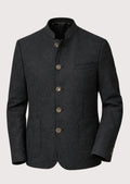 Man wearing a dark grey trachten jacket with modern tailored fit.