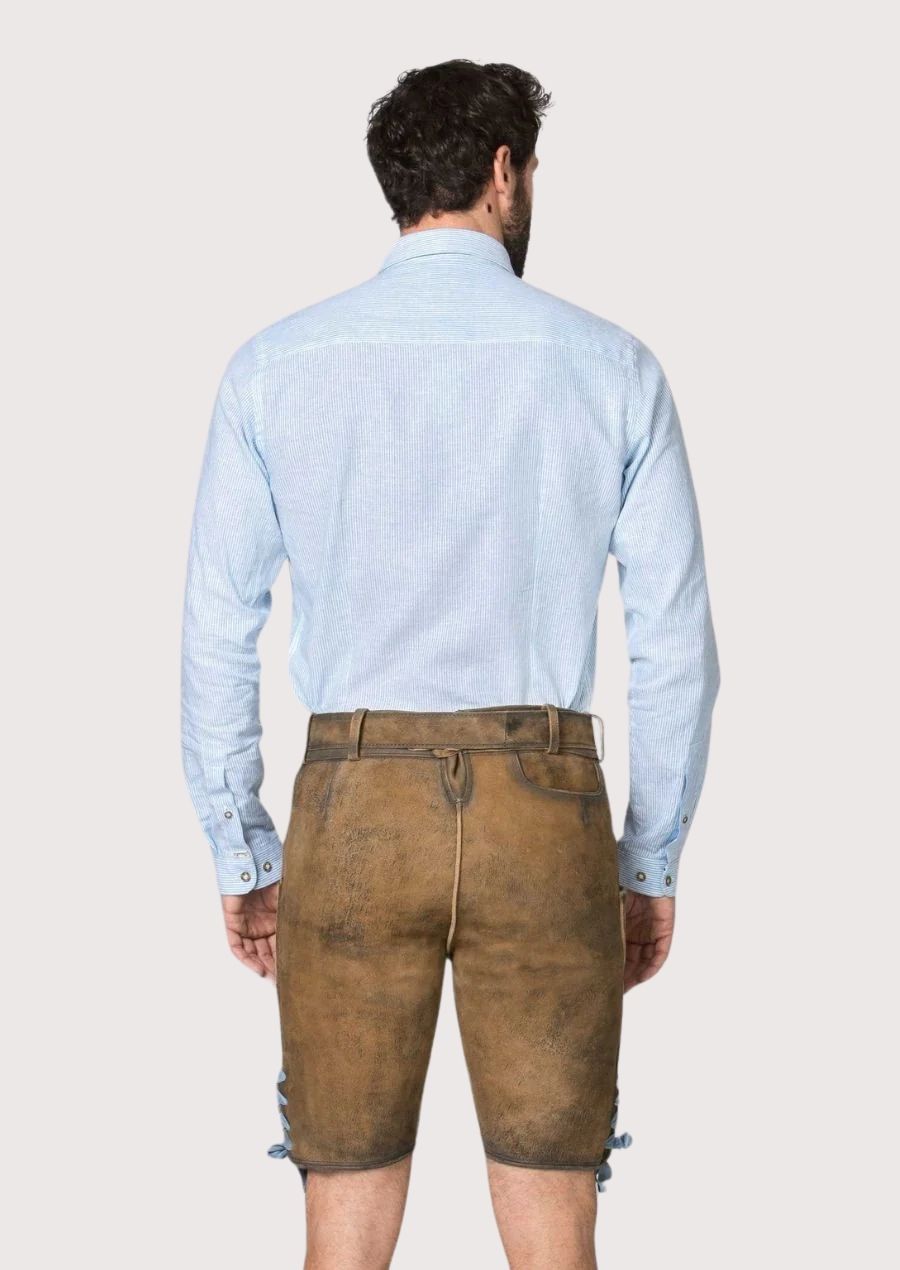 Premium goatskin lederhosen featuring detailed lion embroidery and classic Oktoberfest appeal
