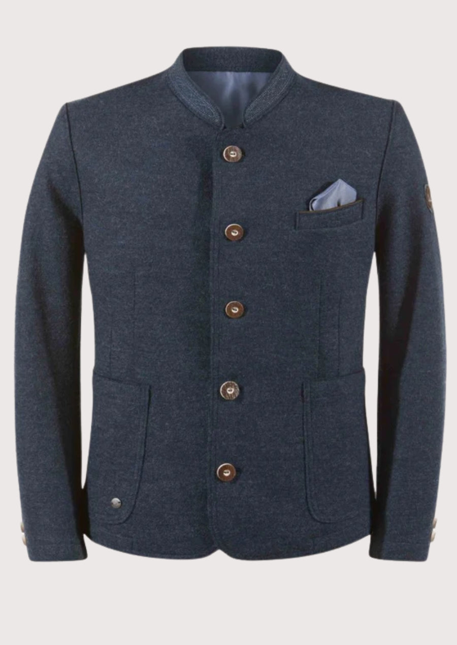 Man wearing a navy trachten jacket with metal buttons.