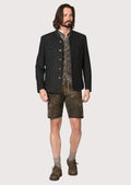 Elegant men’s German folk jacket in deep charcoal with forest green trim, combining timeless Trachten design with a sharp, tailored silhouette.