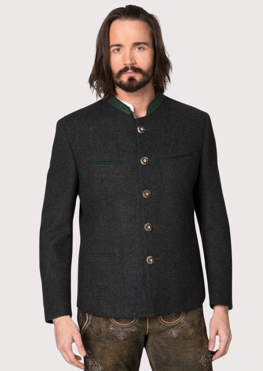 Man wearing traditional Bavarian Trachten jacket in charcoal with green accents and horn style buttons, styled for Oktoberfest with lederhosen.
