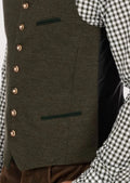 German-style formal vest paired with checkered shirt

