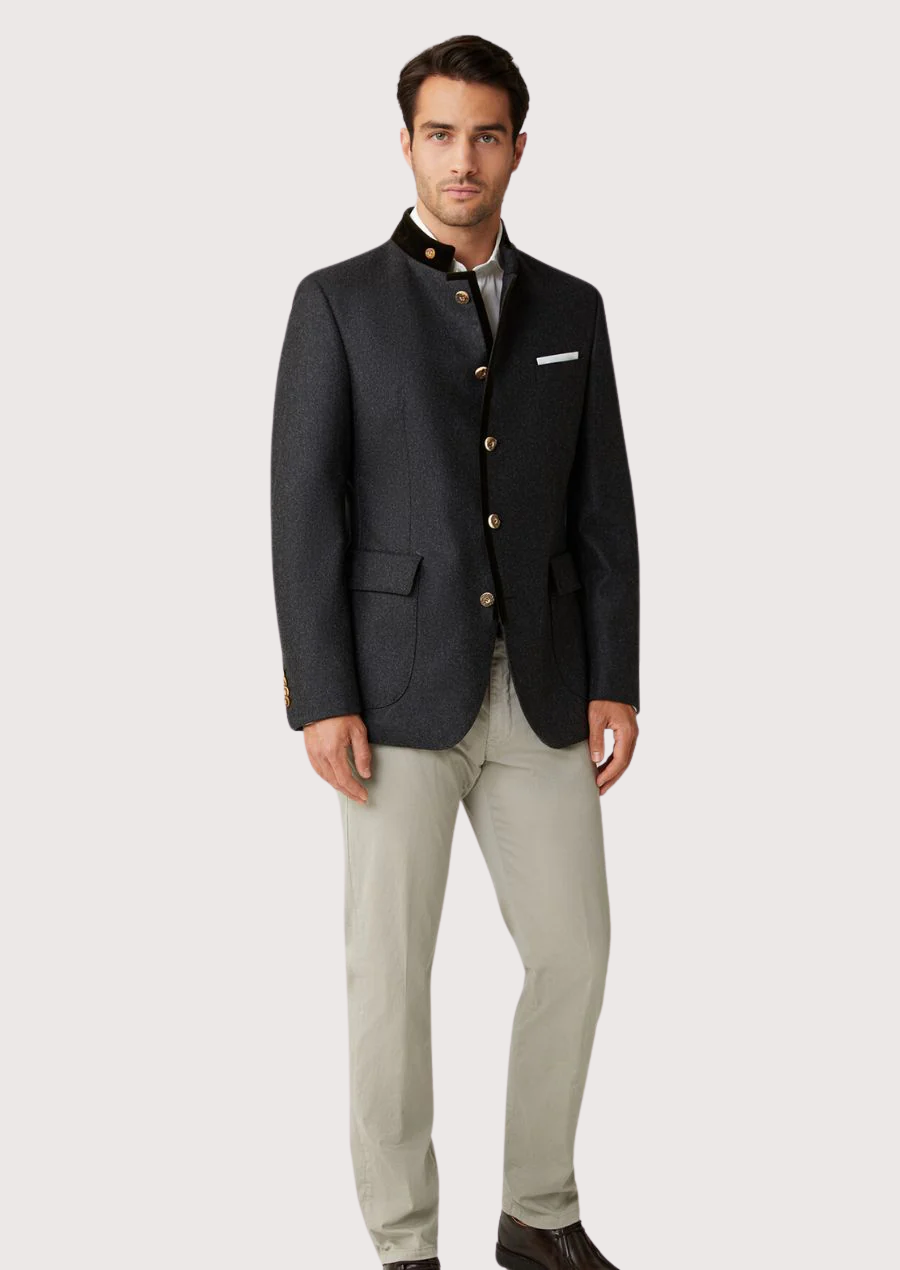 Modern alpine men’s jacket in dark grey with stand collar.