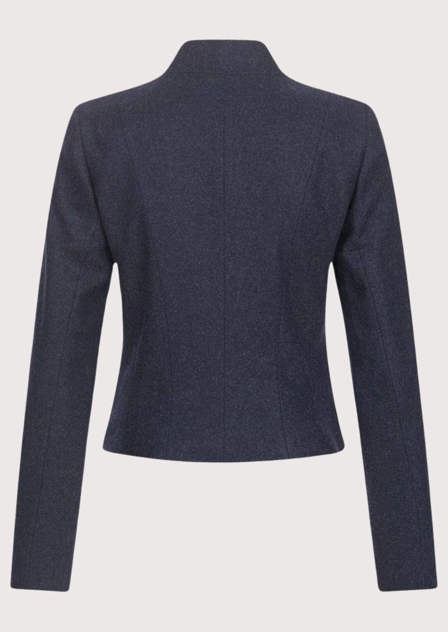 Navy women’s alpine jacket with minimalist design and structured tailoring.