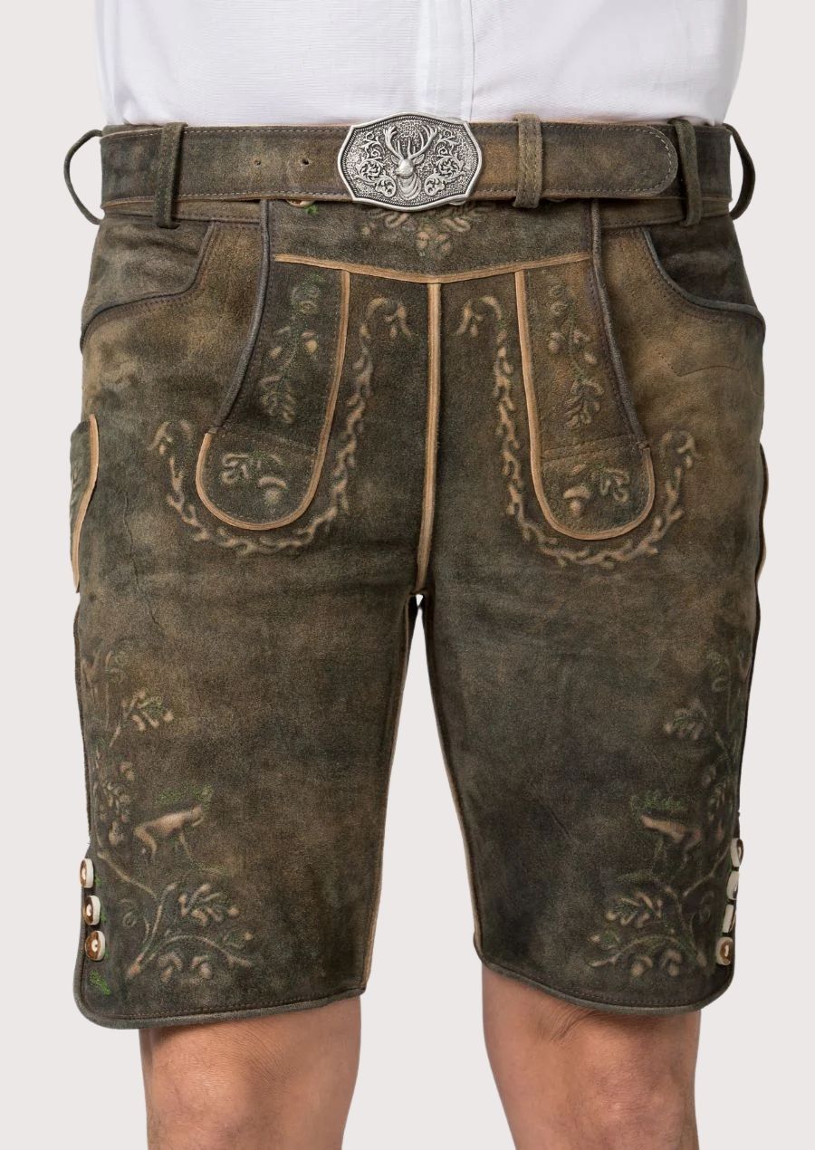 Traditional leather shorts with embroidery and belt on a plain background