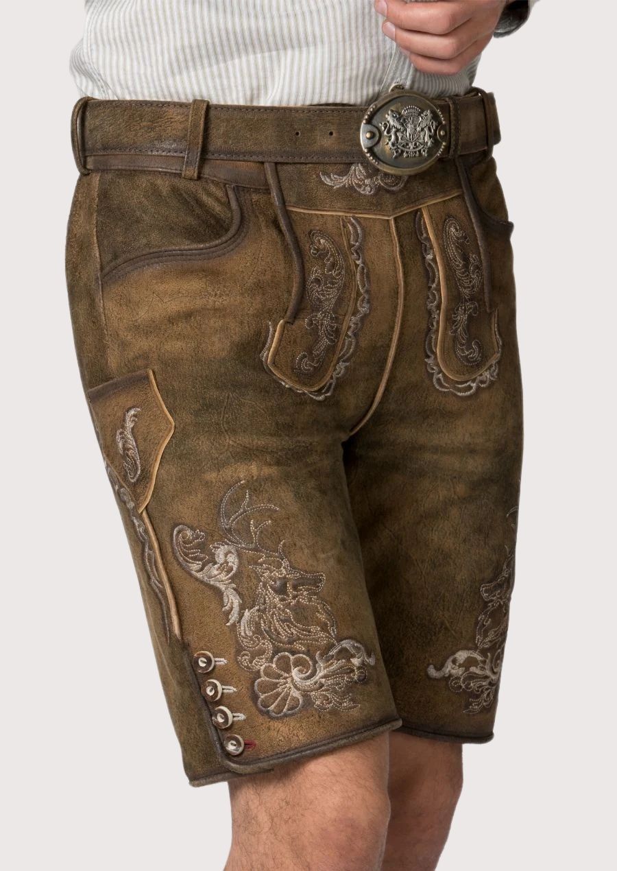 Rustic leather lederhosen shorts featuring embroidery styled with a light striped long sleeve shirt