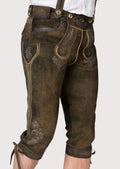 Premium Alpine Bundhosen crafted from goatskin suede with heritage-inspired embroidery and knee-length fit