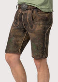 Traditional brown lederhosen shorts showcasing forest-inspired embroidery and authentic craftsmanship