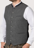 Traditional German Trachten vest styled with white shirt and lederhosen

