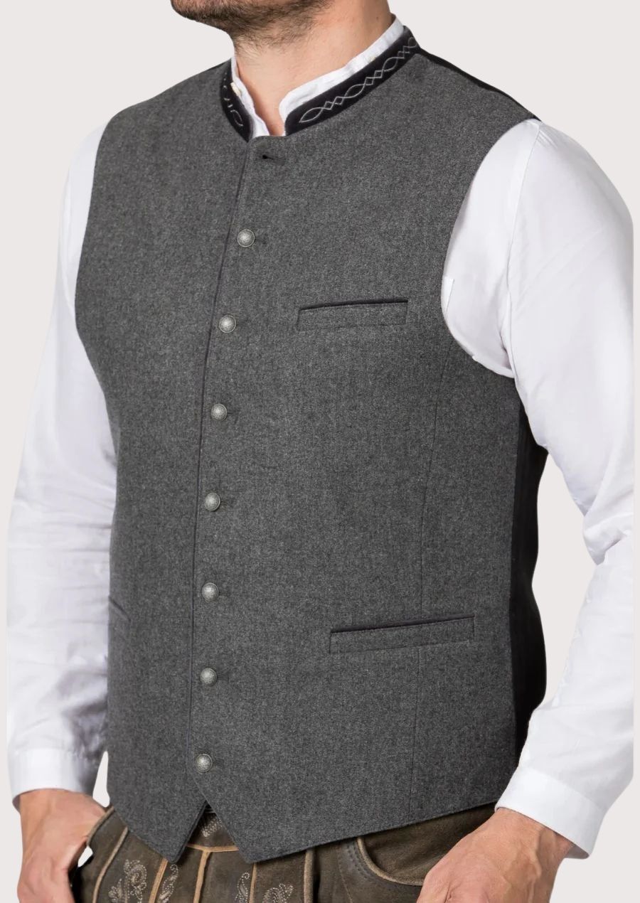 Traditional German Trachten vest styled with white shirt and lederhosen

