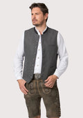Close-up of horn-style buttons on Bavarian-style men’s vest

