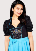 Premium women's Trachten Dirndl with floral embroidery, decorative silver hooks, bright blue apron, and classic Oktoberfest design.