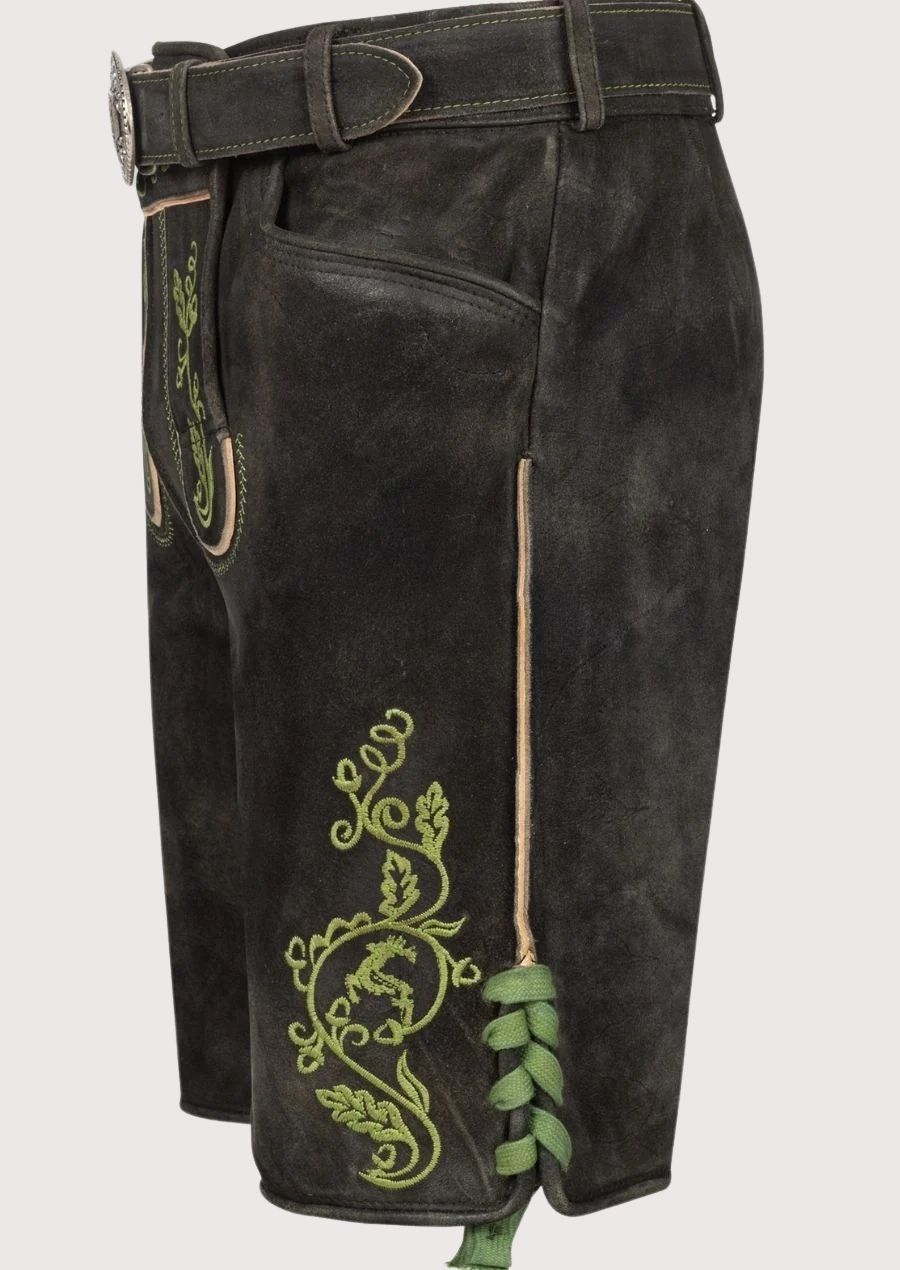 Traditional black leather lederhosen shorts with green embroidered motifs and classic Alpine styling