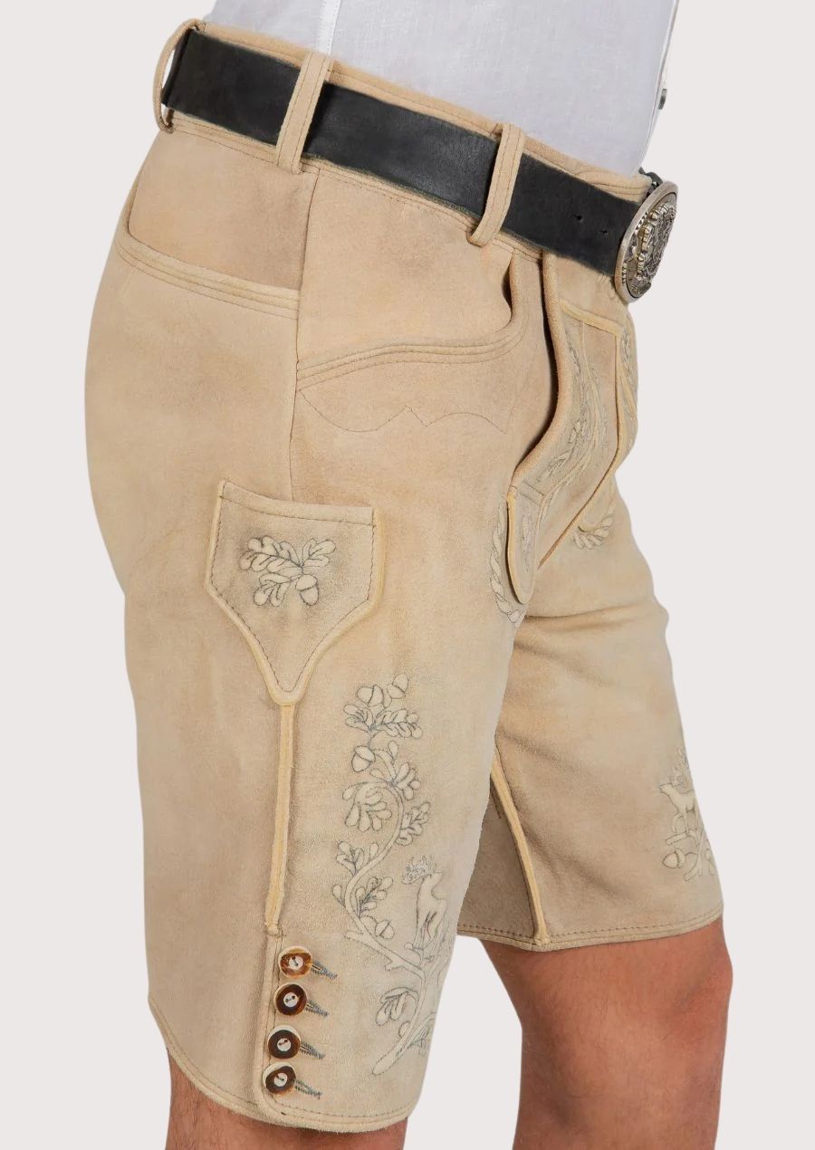 Authentic ivory-toned leather lederhosen shorts with refined embroidery and heritage-inspired craftsmanship