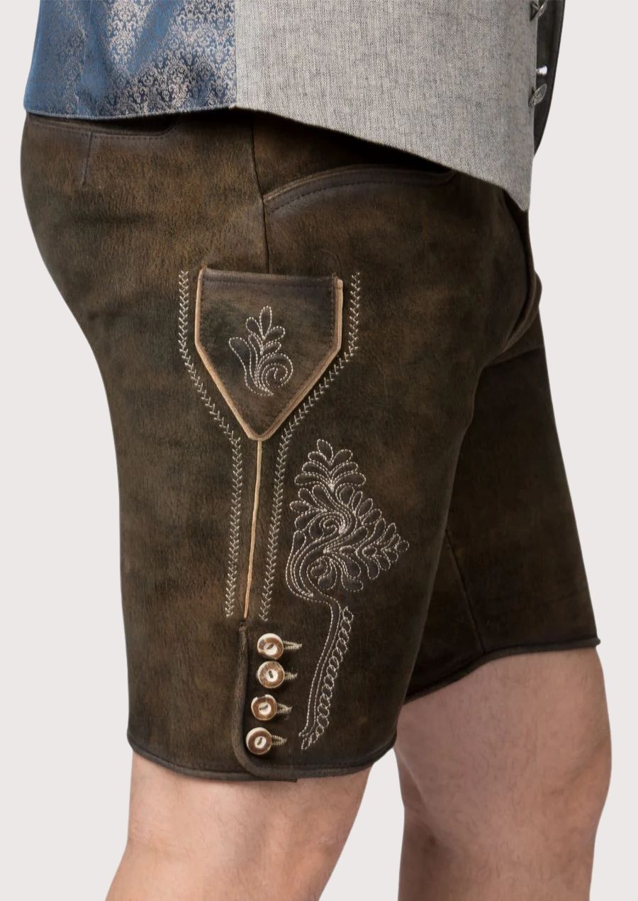 Authentic Oktoberfest lederhosen for men in premium leather with intricate stitching and a stylish belt.