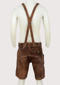 Authentic brown suede lederhosen with embroidered suspenders and detailed deer artwork for Oktoberfest