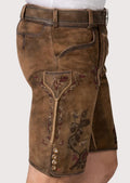 Rustic brown suede lederhosen crafted with detailed embroidery and traditional Oktoberfest appeal
