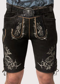 raven black suede skull lederhosen with silver embroidered patterns, lace-up sides and Bavarian character