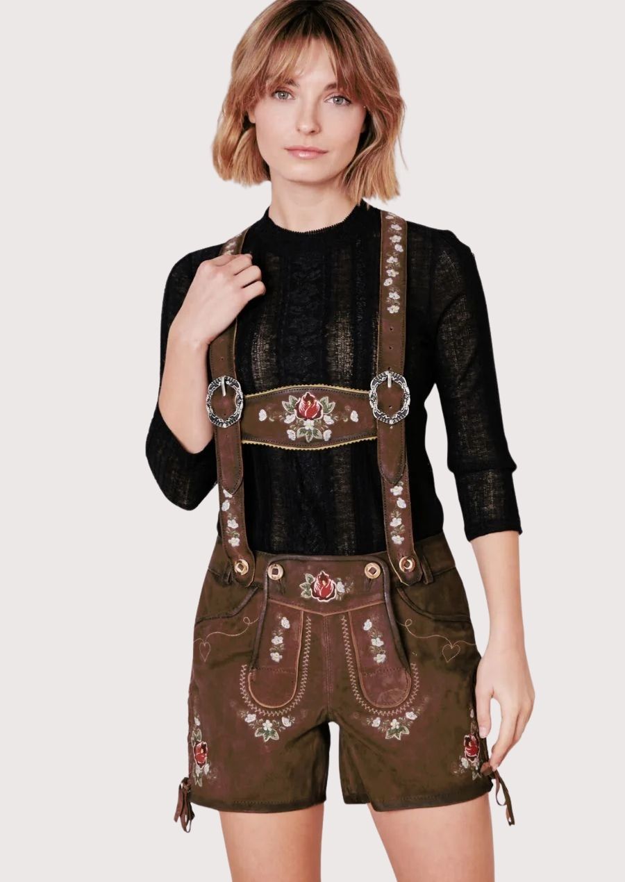 Women's brown suede lederhosen with suspenders featuring red rose embroidery and authentic Bavarian craftsmanship.