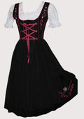 Women's Bavarian Dirndl dress with a black embroidered bodice, rose pink lace-up corset, matching apron, and traditional Alpine festival design.
