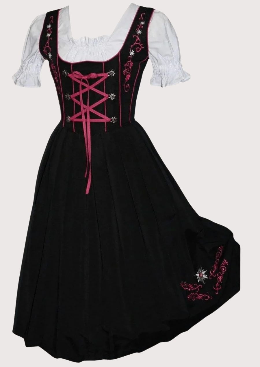Women's Bavarian Dirndl dress with a black embroidered bodice, rose pink lace-up corset, matching apron, and traditional Alpine festival design.