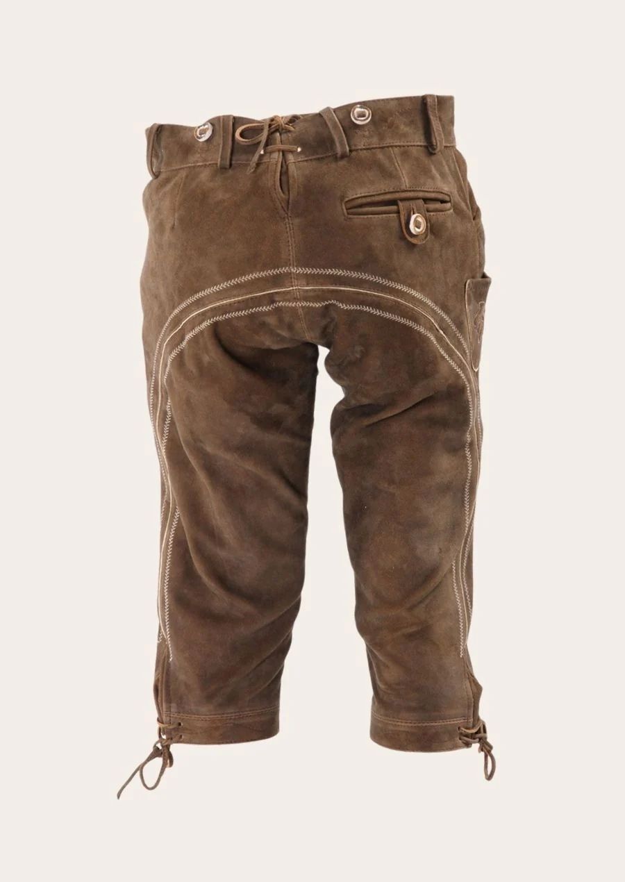 Rustic Alpine Bundhosen crafted from soft brown suede leather with decorative embroidery and knee-length styling