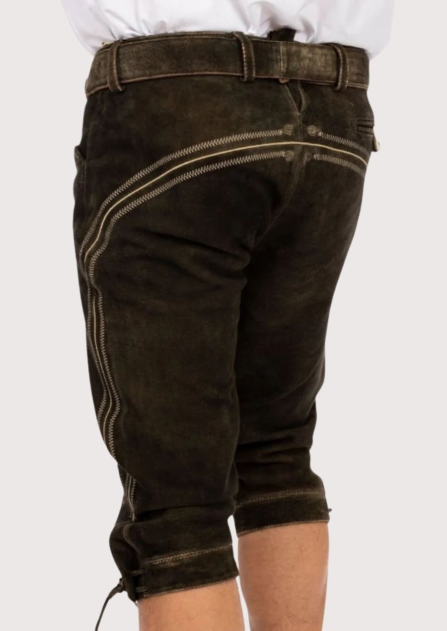 Rustic Bavarian Bundhosen made from weathered brown goatskin suede with ornamental embroidery and traditional detailing